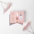 Decants Miss Dior perfume set with pink packaging on a white background