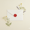 Premium White envelope with red wax seal and floral decorations