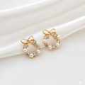 Gold earrings with pearls and crystals for gifting