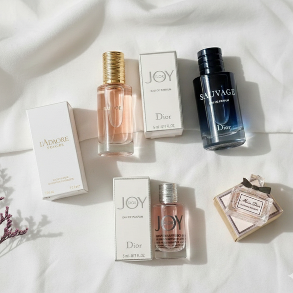 Set of miniature Dior perfume bottles arranged for gifting